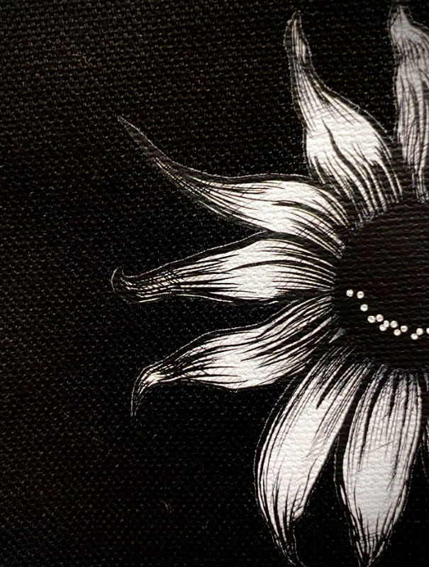 Canvas crossbody pouches featuring a smiling sunflower graphic in black and natural colors.