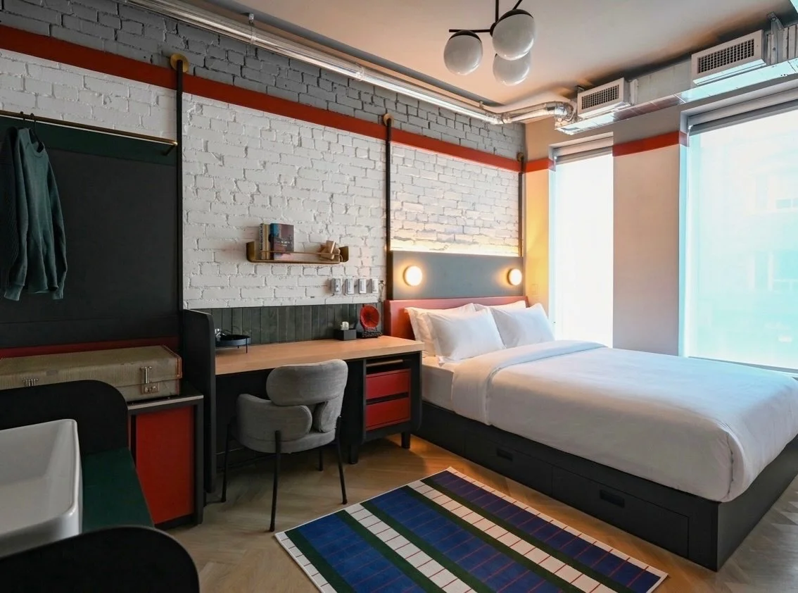 Exposed brick. Soft light. Bloor St through the glass.   #NomasHotel #TheAnnex #BlogTO #BoutiqueHotel #TorontoHotel