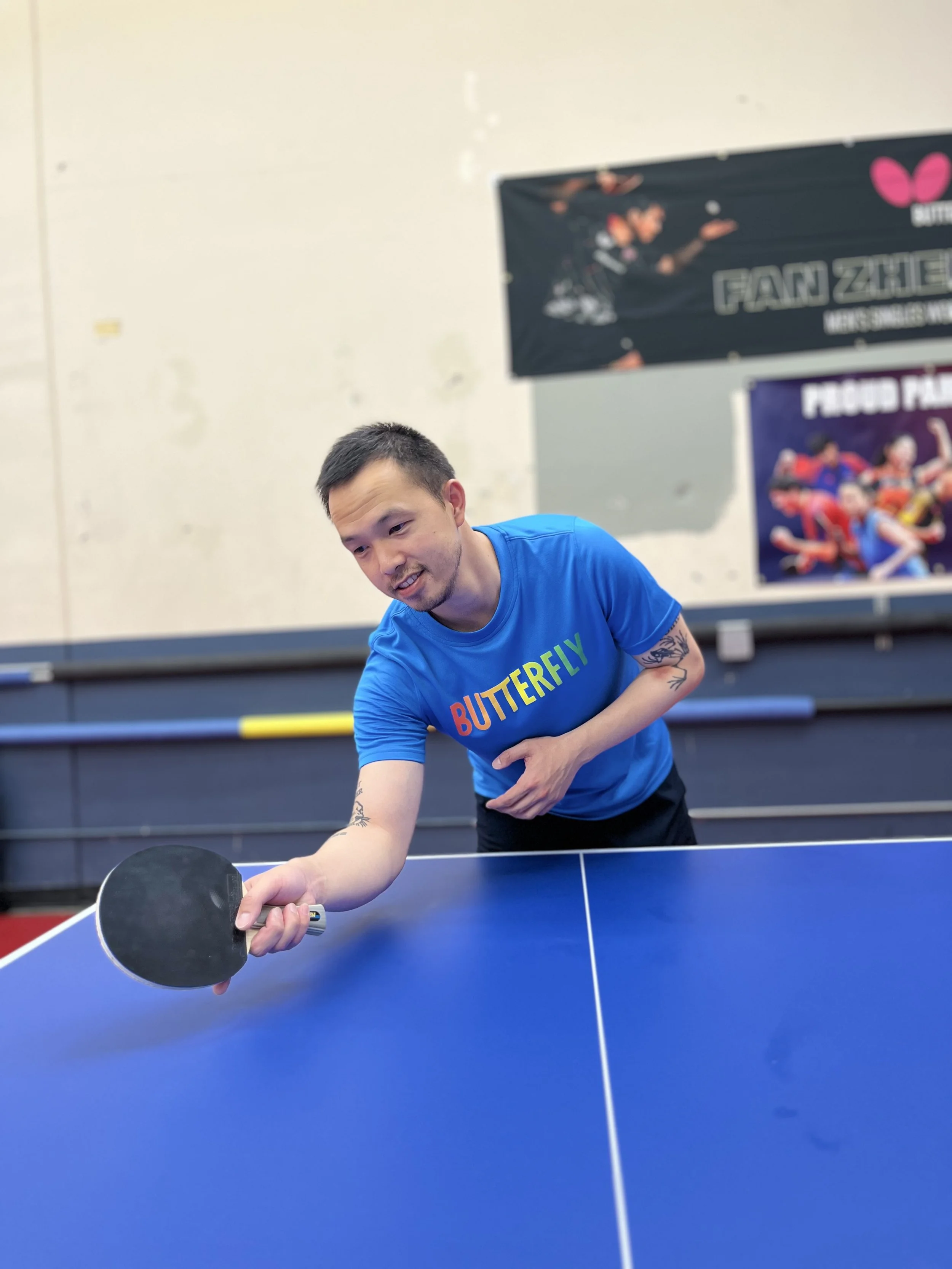 coach Sean Lee playing in a tournament