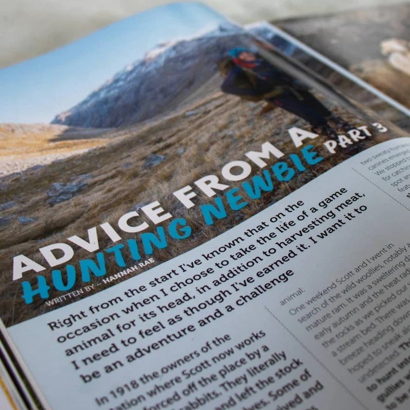 Magazine article titled "ADIVICE FROM A HUNTING NEWBIE PART 3" with a background of mountains and a woman in outdoor gear standing on rocky terrain.