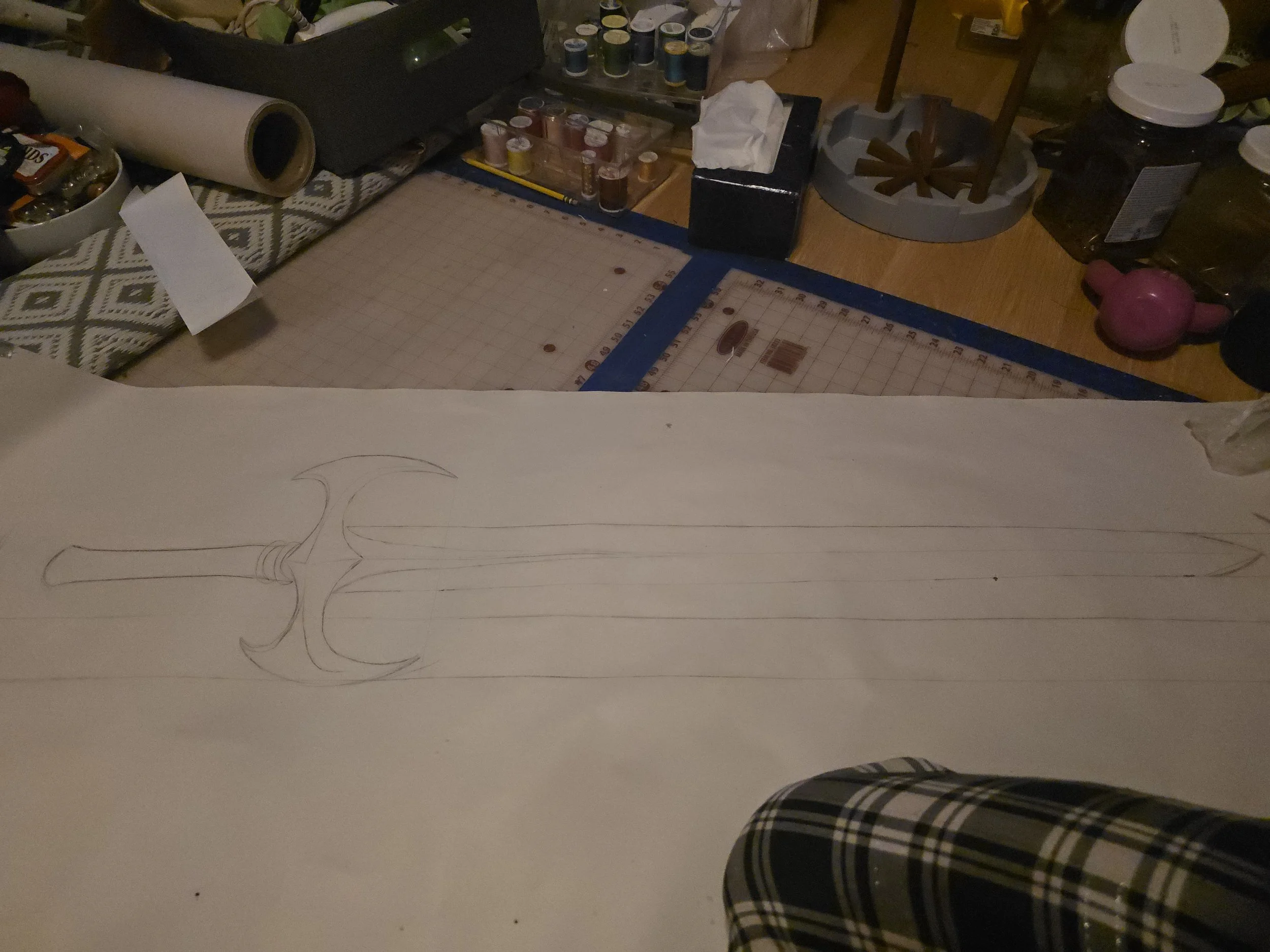 full sized drawing of a longsword with a large handle