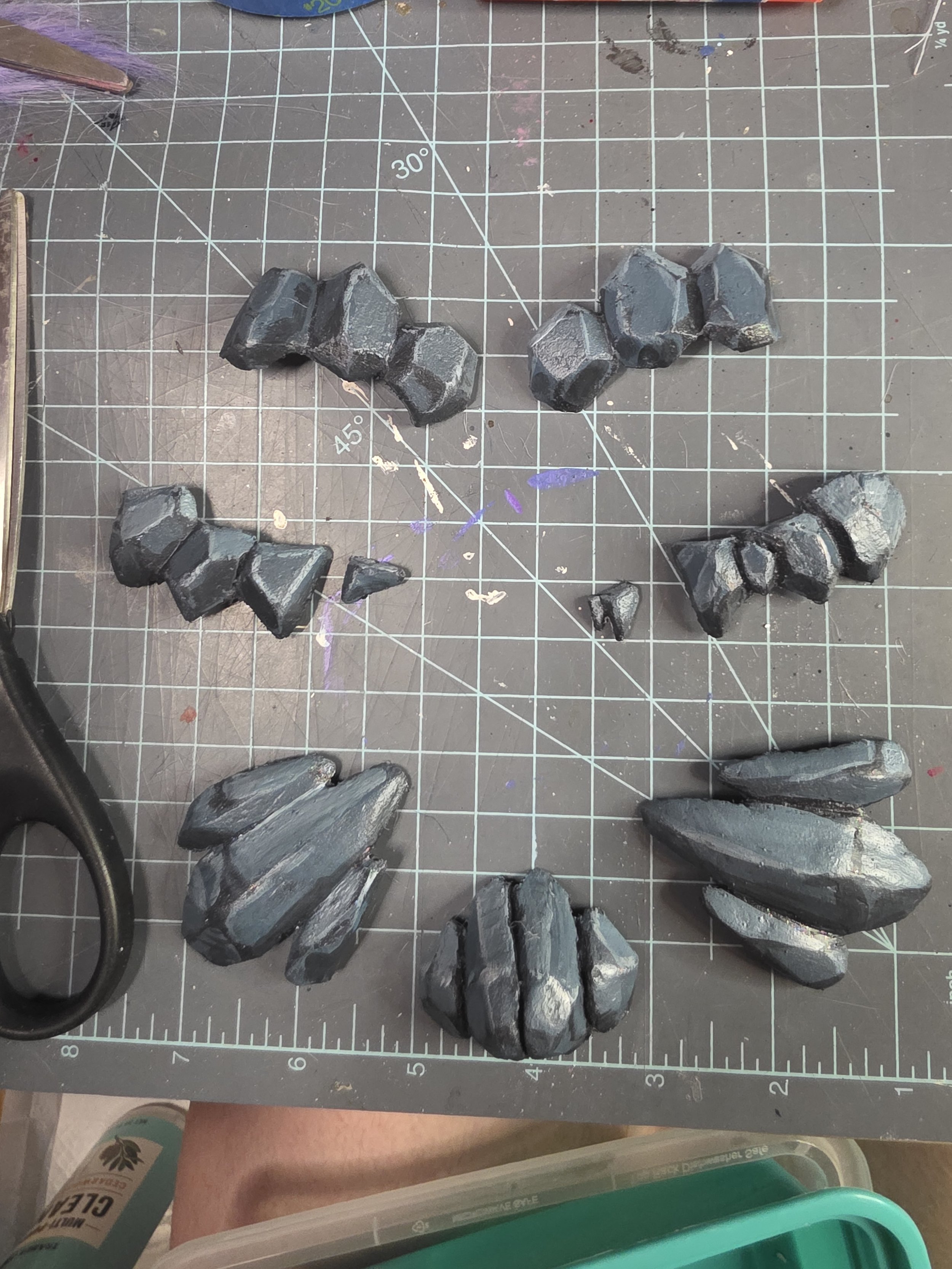 worbla rocks painted bluish gray with lighter and darker cel shading