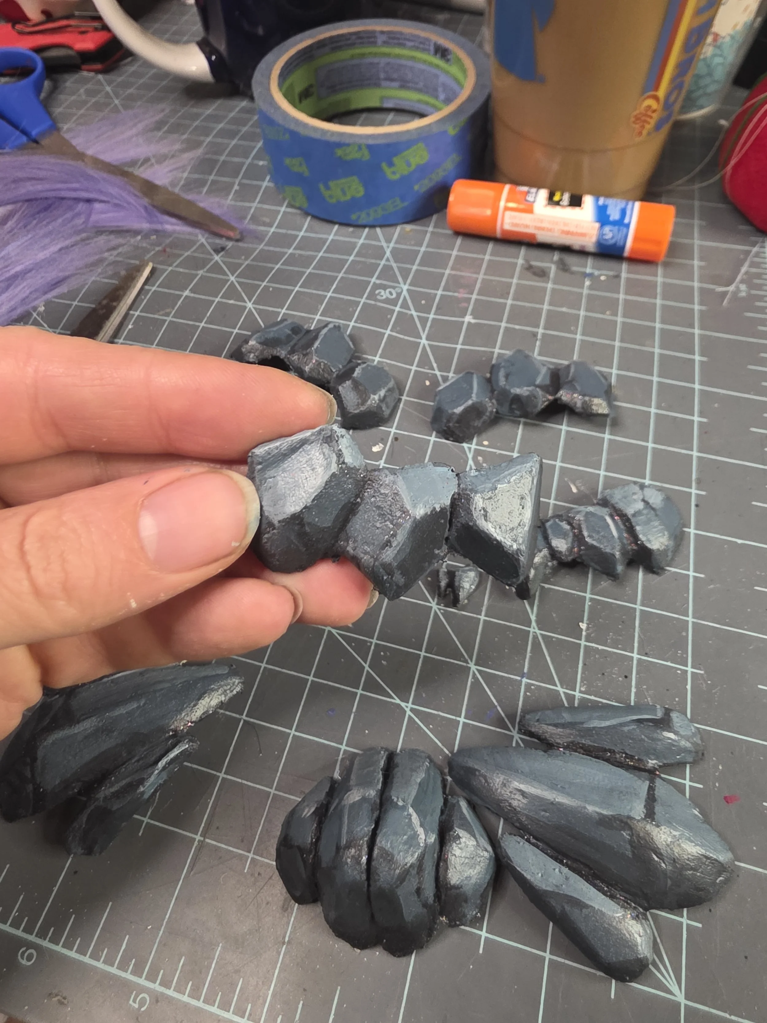 worbla rocks painted bluish gray with lighter and darker cel shading