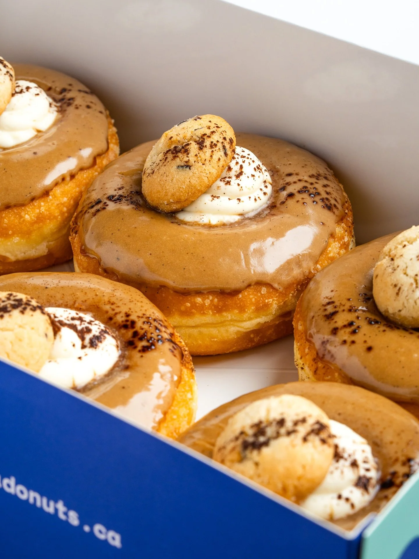 Our take on tiramisu: coffee glaze, cacao cookie, cocoa dust, and a dangerously good tiramisu filling. Yes, it&rsquo;s as good as it sounds, and it&rsquo;s available now. ☕️🍩