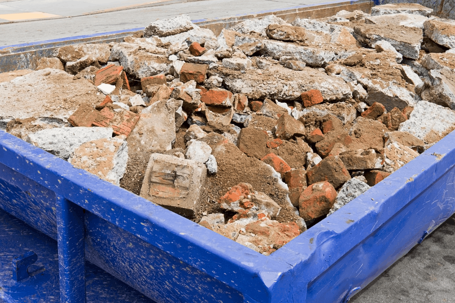 Renting a Dumpster for Concrete, Asphalt &amp; Heavy Debris: What You Need to Know
