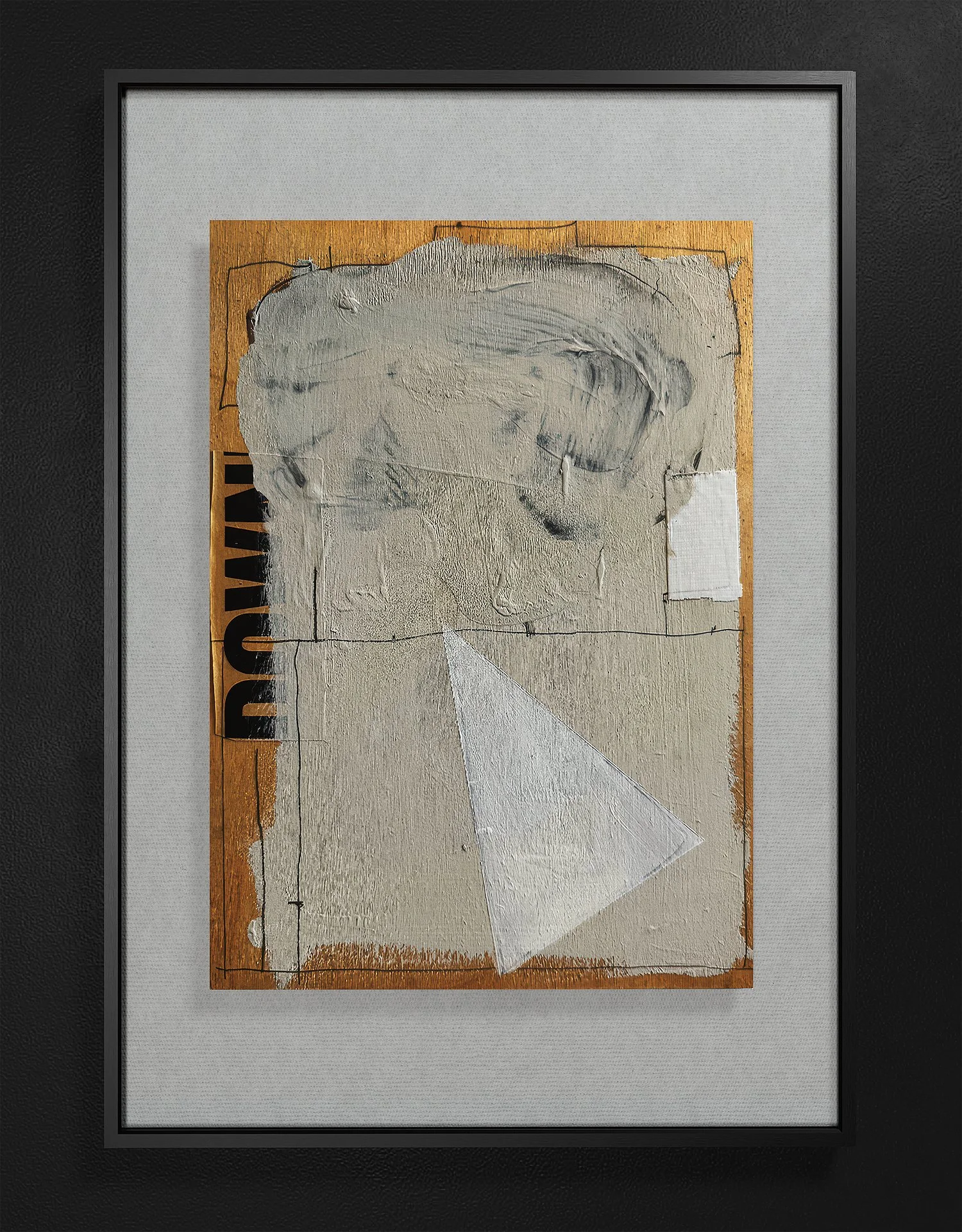 Abstract mixed media artwork mounted in a black frame, featuring textured cream and white paint, torn paper, and black text on a wooden background.