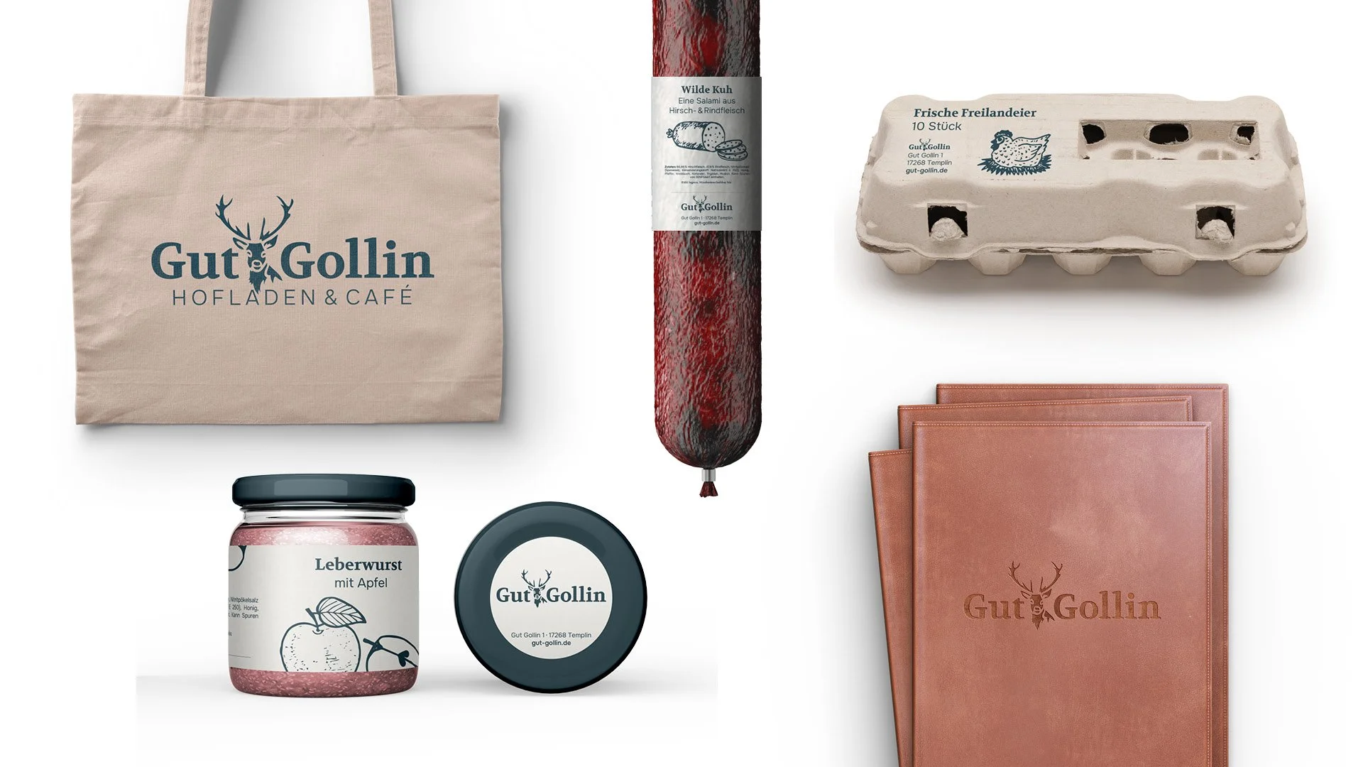 Collection of grocery items including a paper tote bag with Gut Gollin logo, a packaged salami, a carton of eggs, a jar of liverwurst with apple, a roll of salami, and a couple of brown folders with Gut Gollin logo.