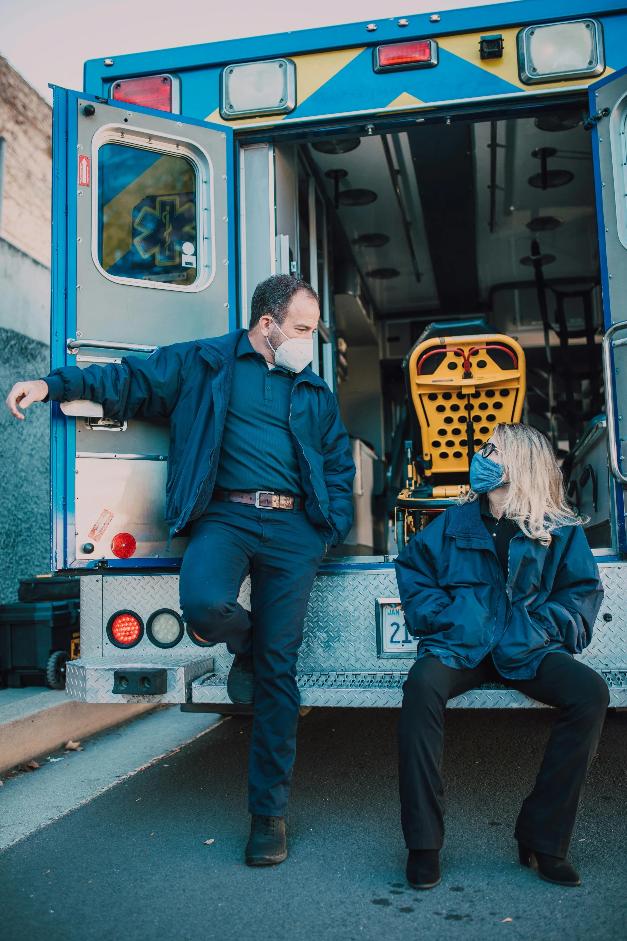 First Responder's looking happily at one another to symbolize healing from trauma and PTSD.