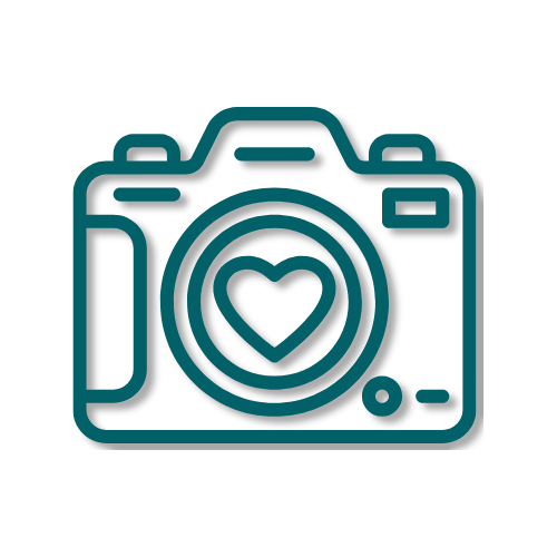 Icon of a camera with a heart symbol in the lens.