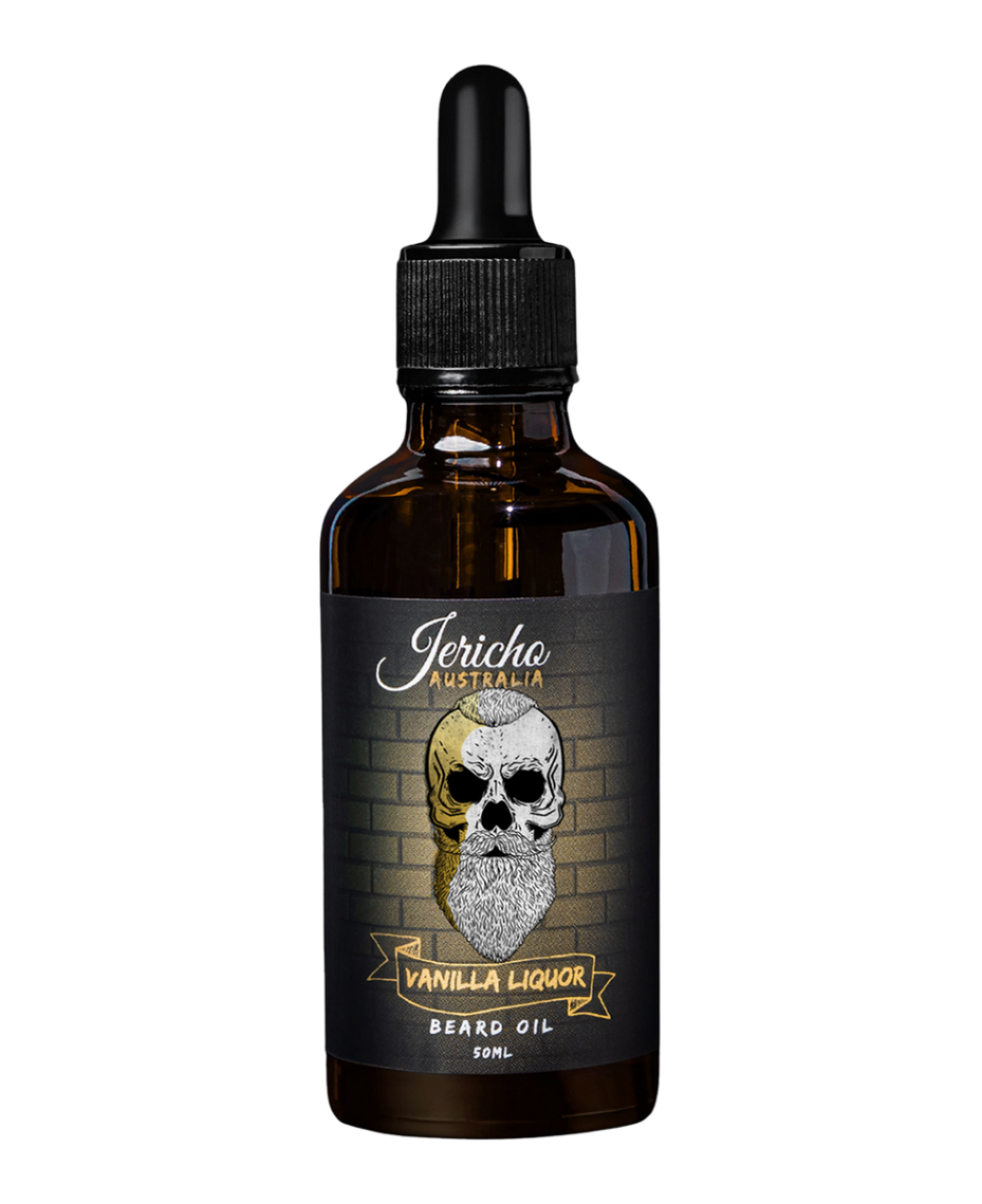 A small brown glass bottle of Jericho Australia Vanilla Liquor Beard Oil with a black dropper cap, label featuring a skull with a beard and a yellow brick wall background.