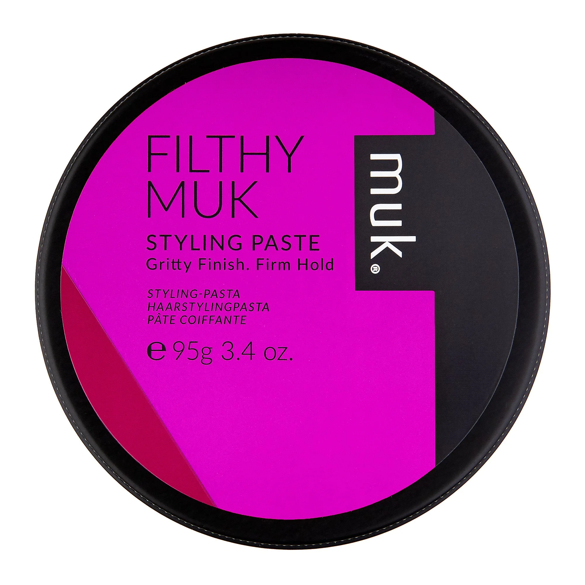 Round container of MUK Filthy Muk Styling Paste with pink, black, and purple label, indicating gritty finish and firm hold, 95 grams (3.4 ounces).