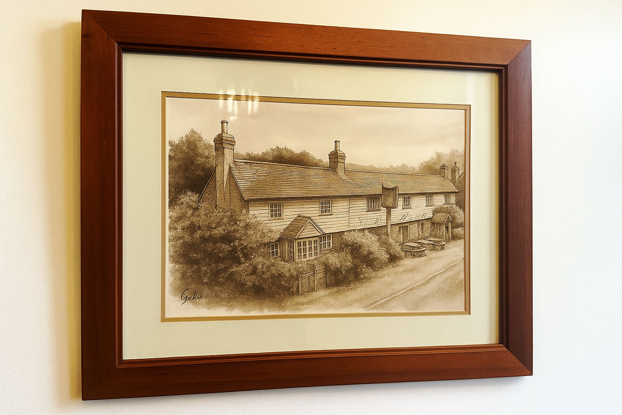 Framed sketch of a white weatherboarded terrace of a traditional Kentish pub