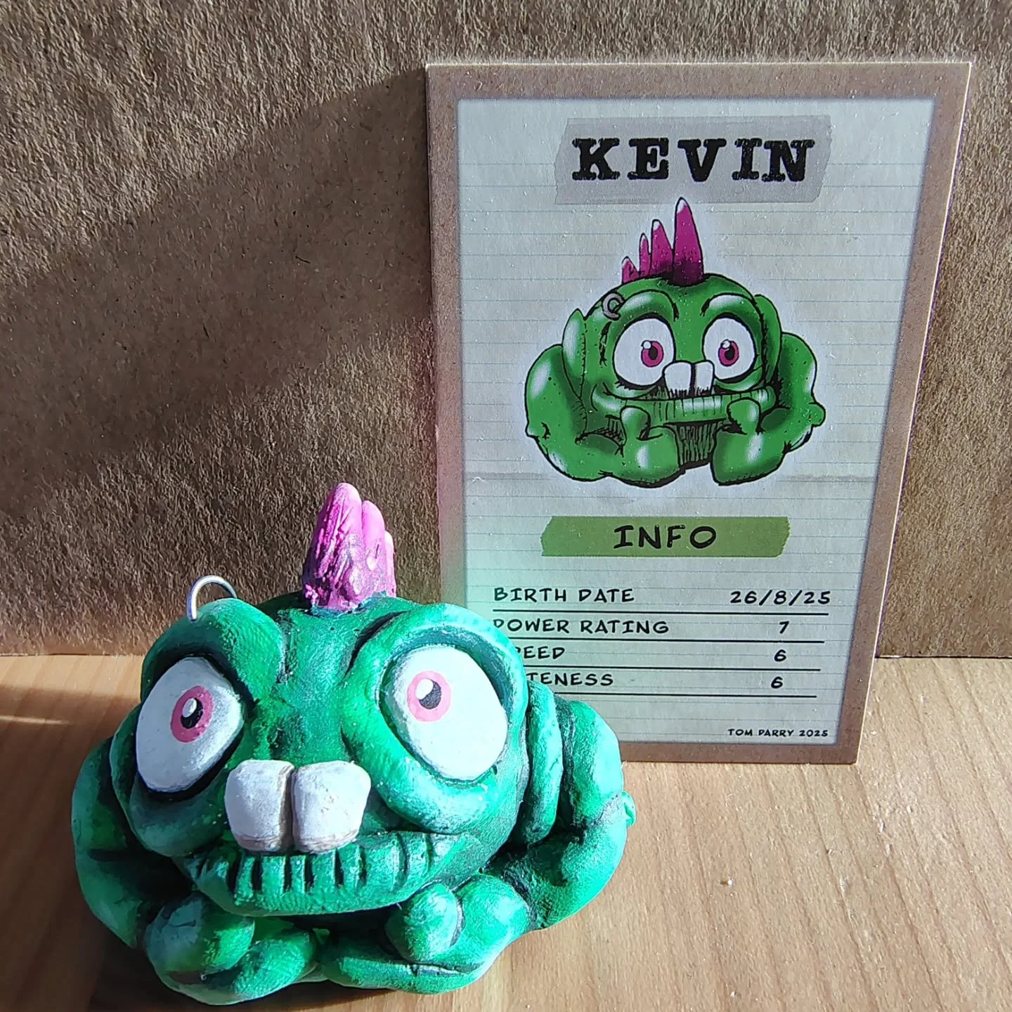 Kevin now has a card! You can now pick up both Kevin and Bert from the online shop and get a character card included with every purchase! #creaturedesign #characterdesign #arttoy #weirdart #wacky #sculpture #resin #monster #creature #alien #cute #col