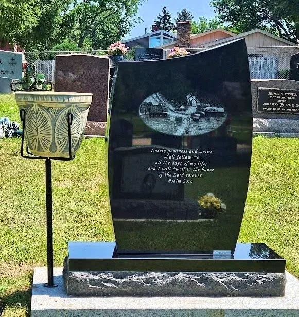 Jet Black Granite Flame Shaped Headstone with Etched Scene