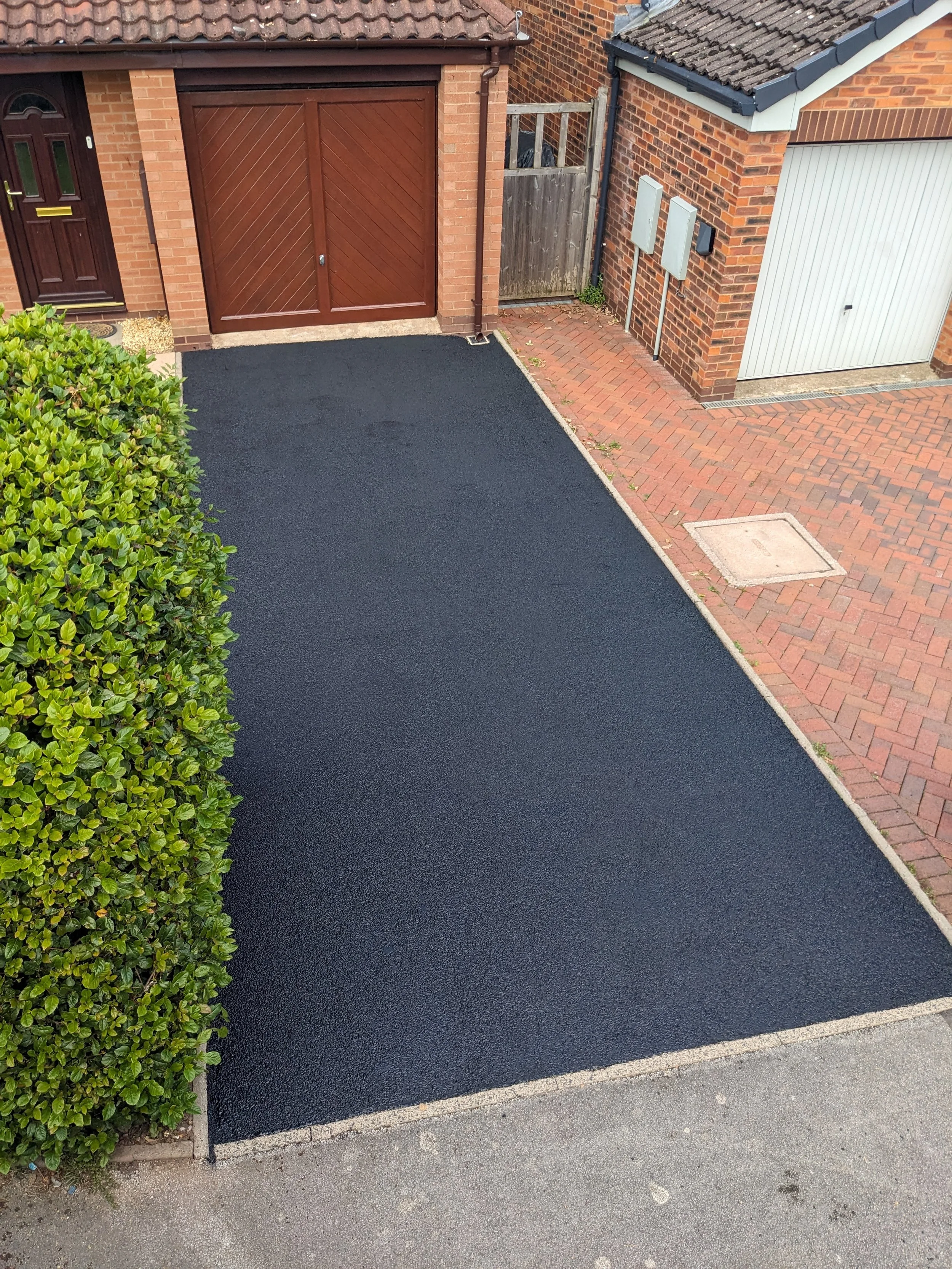 Tarmac driveway cleaning removing moss and surface dirt