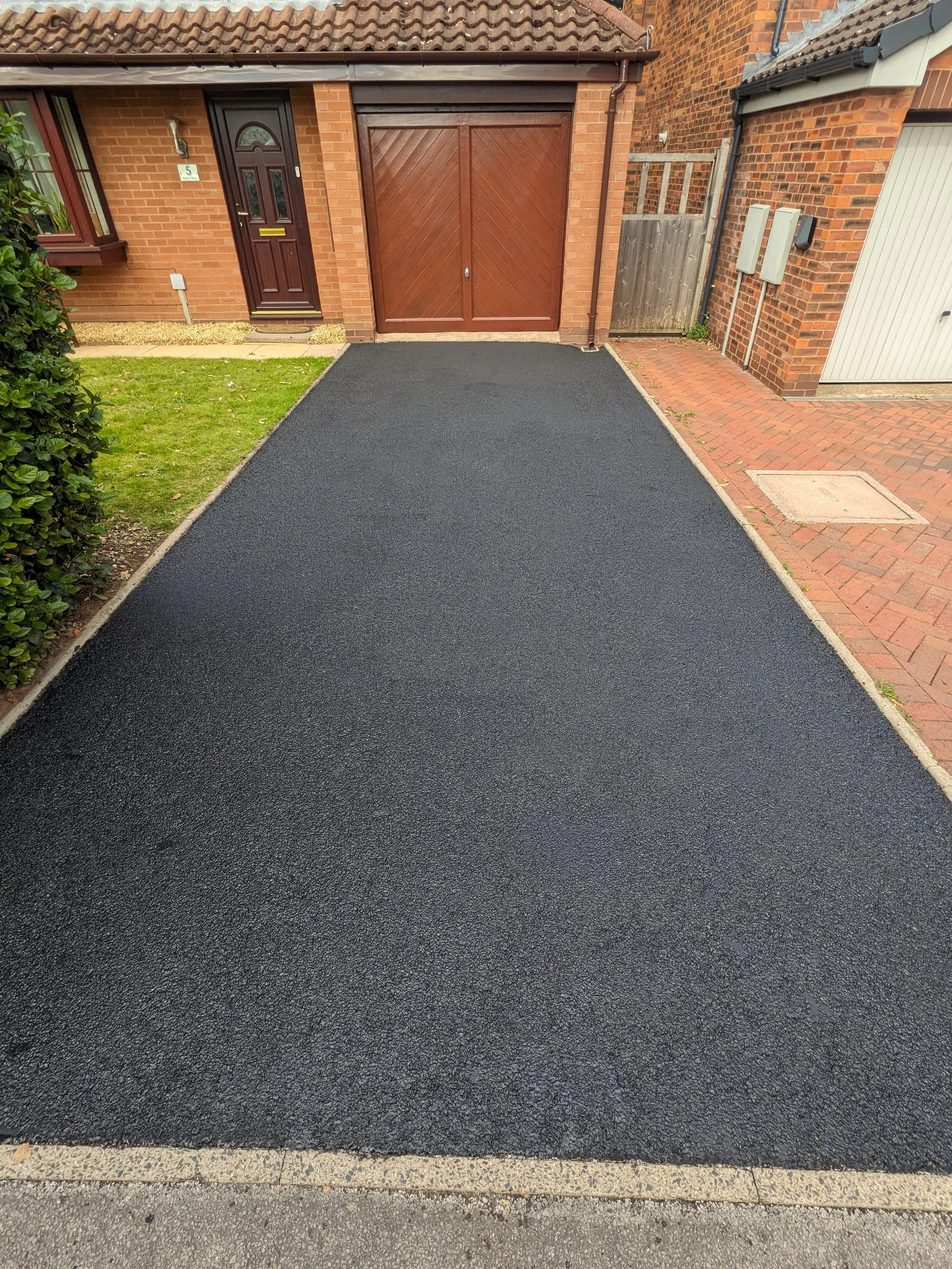 Tarmac driveway cleaning removing moss and surface dirt