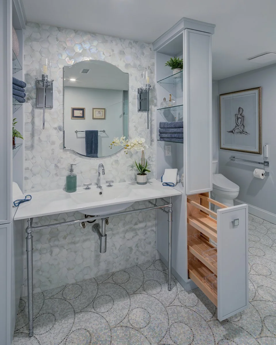 Custom blue aging in place bathroom with a custom cabinet