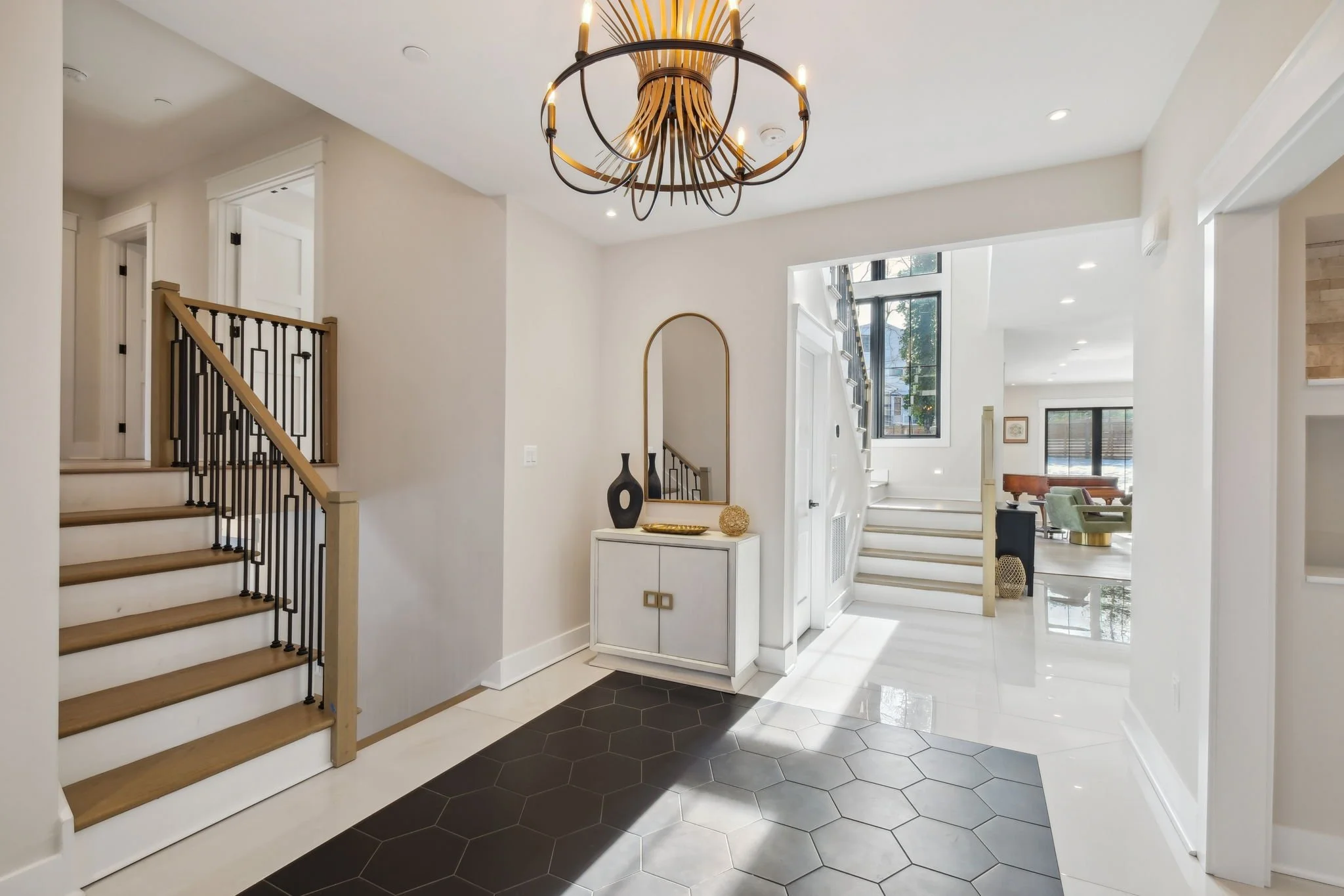 Beautiful tile detail with wood stairs and custom banister
