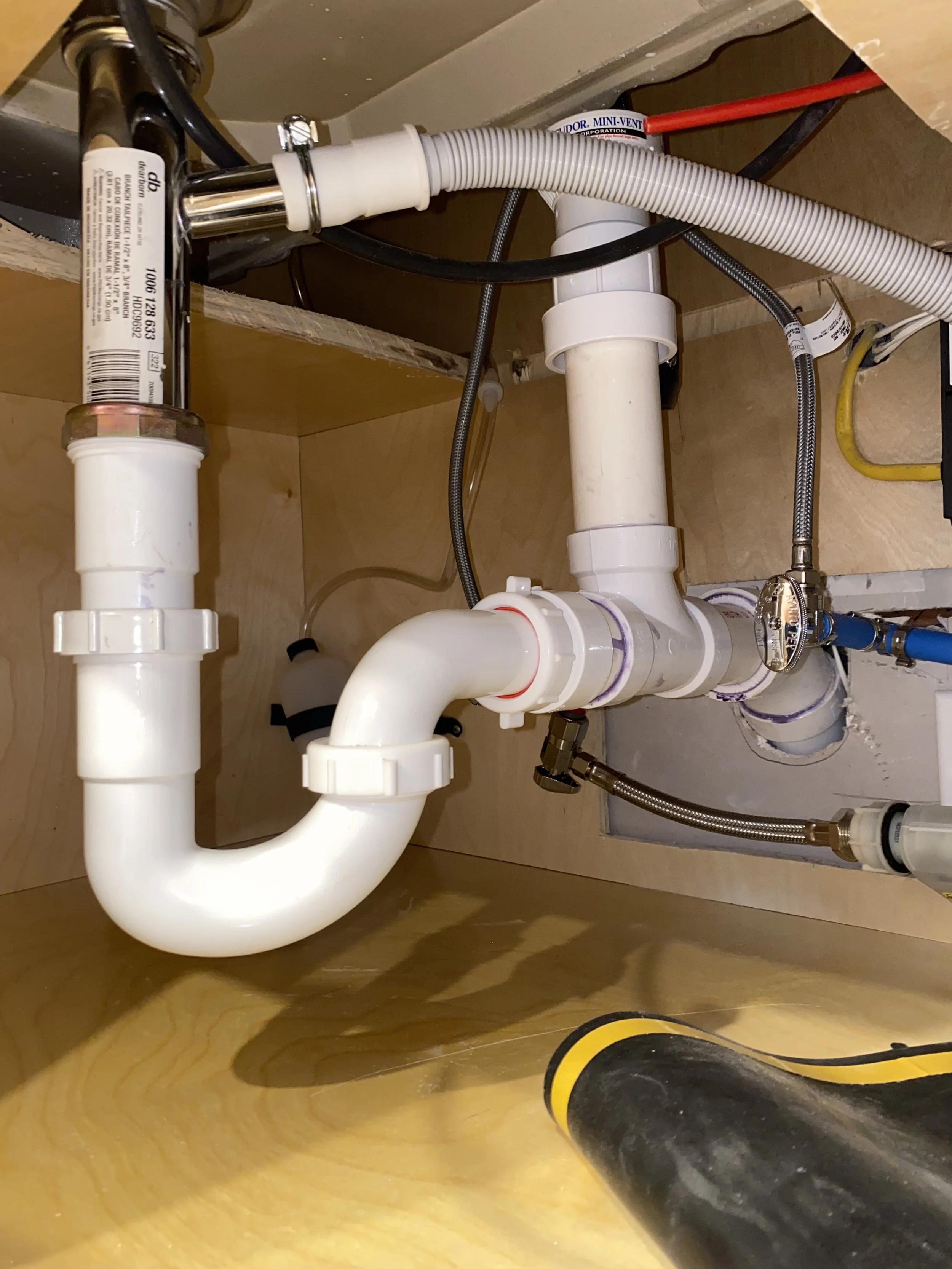 Under Kitchen Drain Plumbing