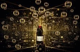 A champagne bottle surrounded by floating bubbles and golden sparkles in a celebratory setting.