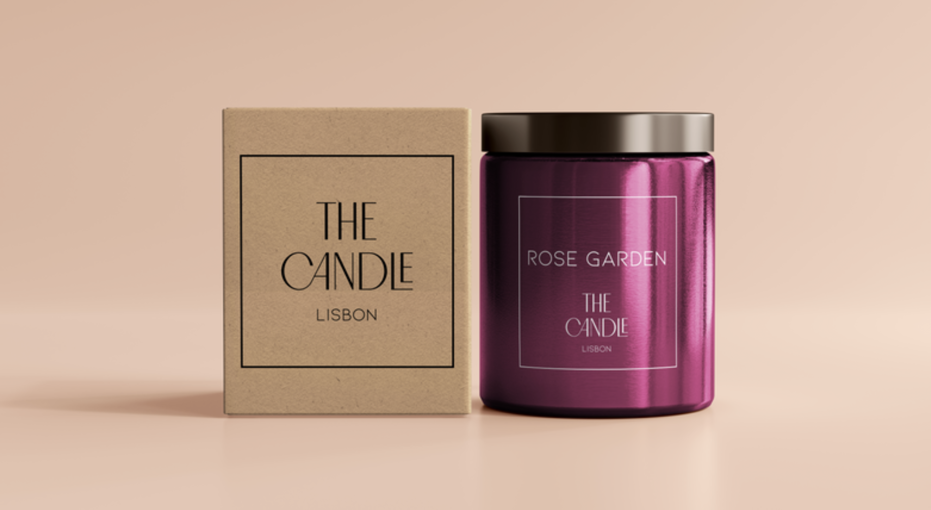 A pink metallic candle jar next to a beige cardboard box with the label 'The Candle Lisbon' and 'Rose Garden' on it, set against a soft pink background.