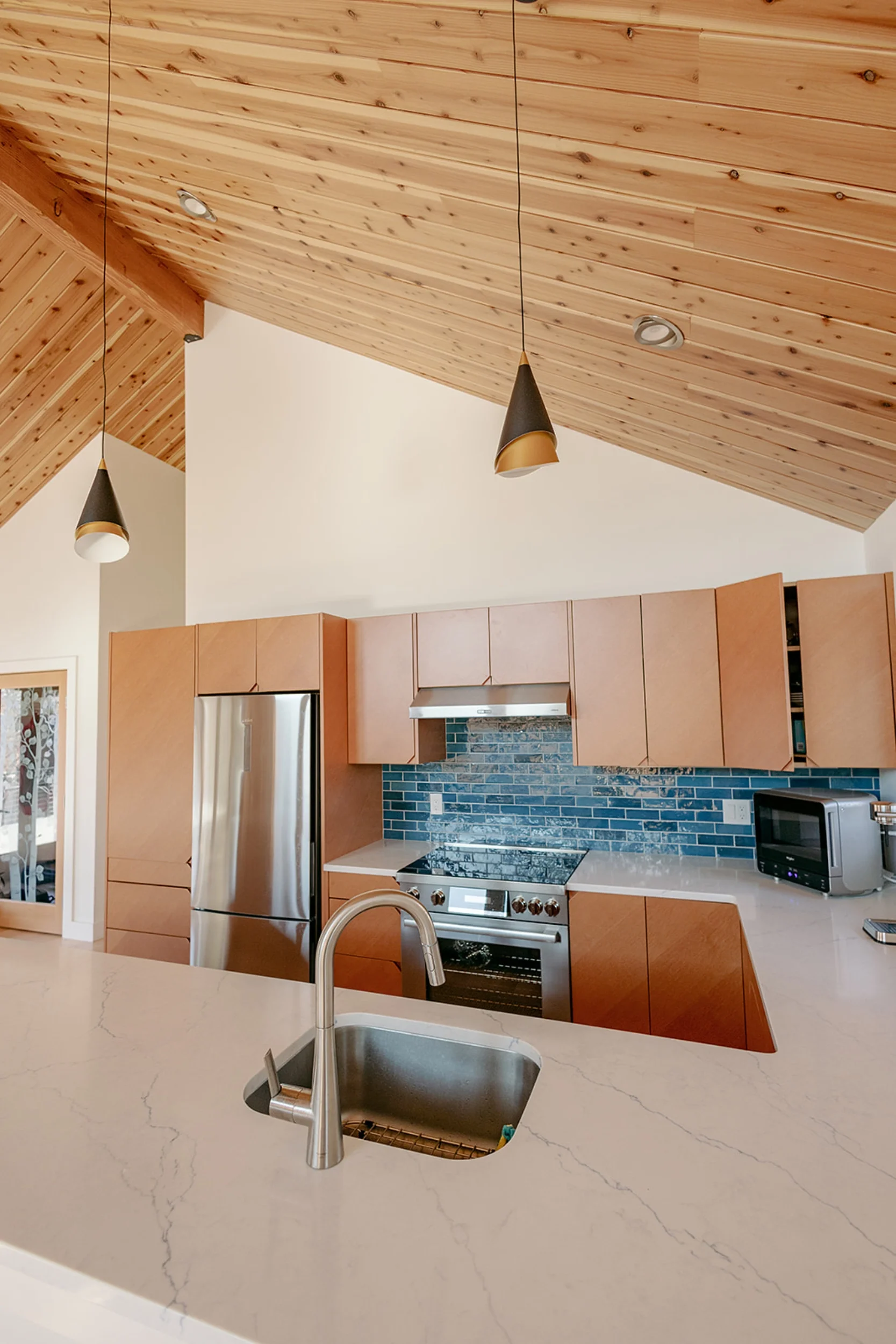 Red Barn Architecture-Deck House-Kitchen-3.webp