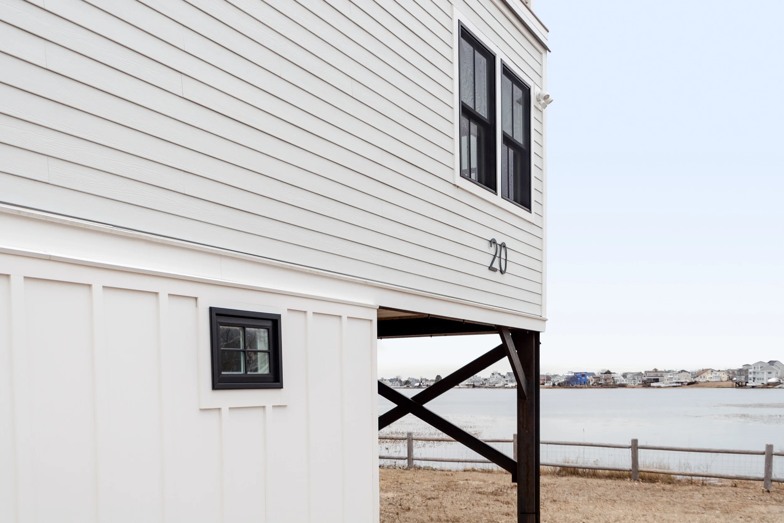 Red Barn Architecture-Upside Down House Water View (Landscape)-.webp