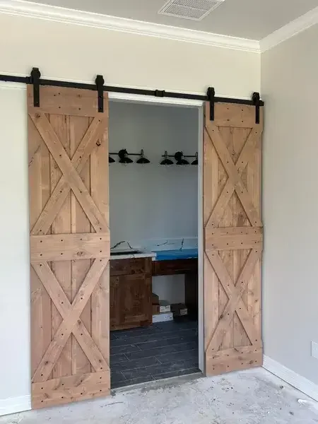 Home-Additions-Gems-Custom-Homes-Baytown-Double-Wood-Door-Entry.webp