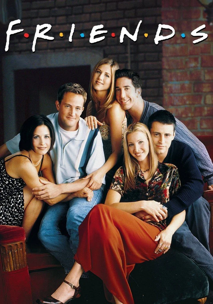 The iconic cast of the TV show "Friends" posing on a couch, with the show's logo above the group.