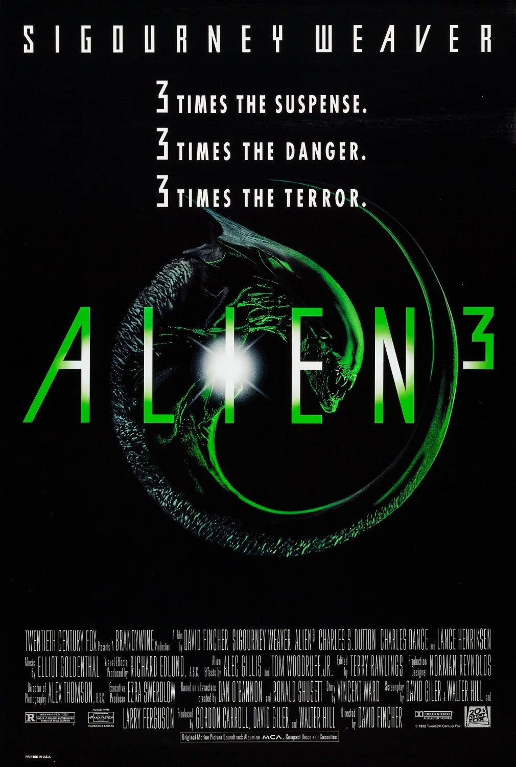 Movie poster for Aliens, with the title in large green letters and a dark background featuring a green alien character. The tagline states '3 times the suspense, 3 times the danger, 3 times the terror.'
