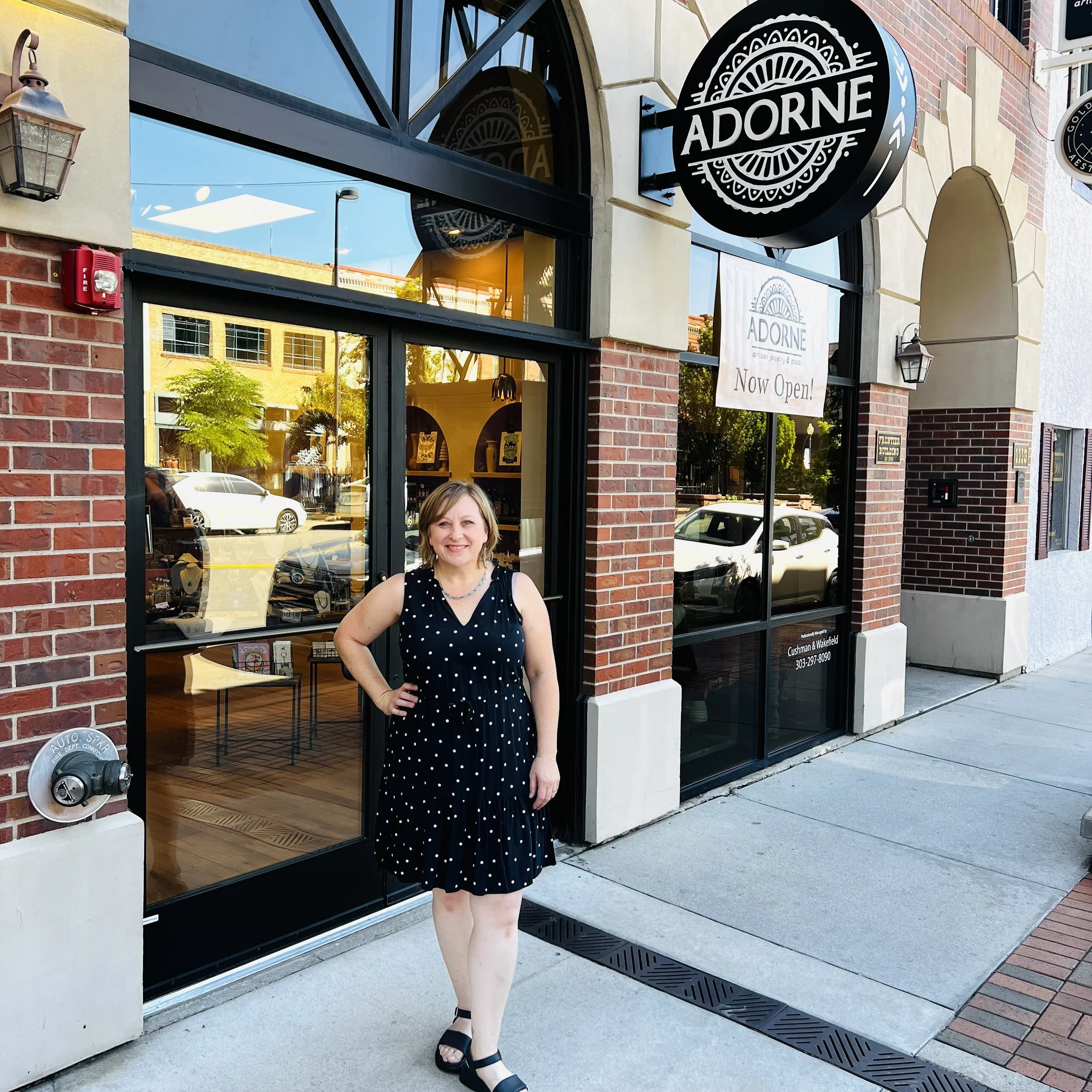 Owner, Sarah DeAngelo, standing in front of the Adorne storefront