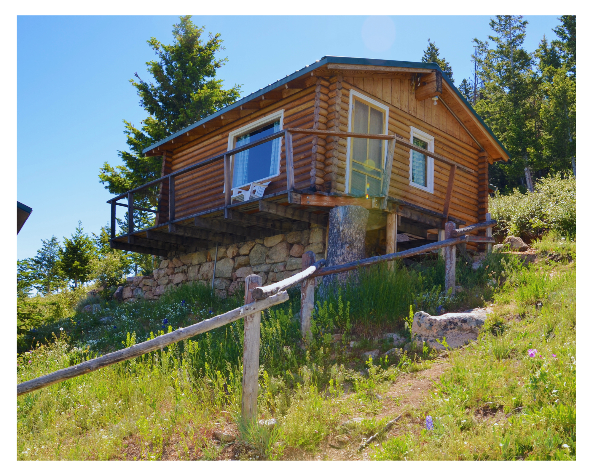 Tom Dorf. A one room faculty or staff cabin with bathroom and a breathtaking view of the lodge and front range. Named for Thomas A. Dorf (1937-1958), son of Ruth & Erling Dorf.