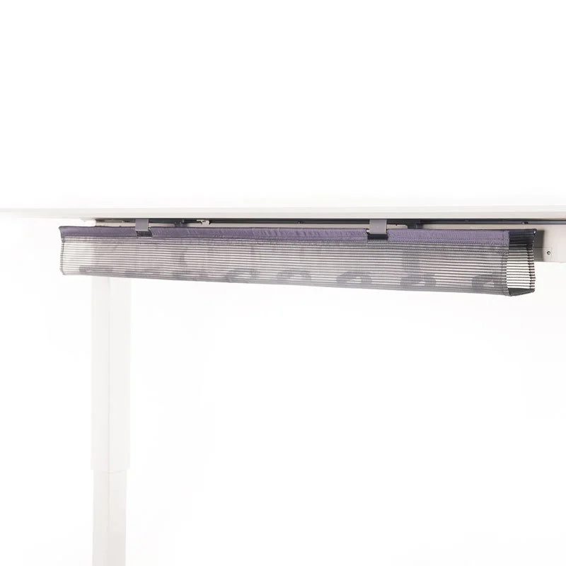 A close-up of a piece of office furniture with a black mesh tray attached underneath, on a white background.
