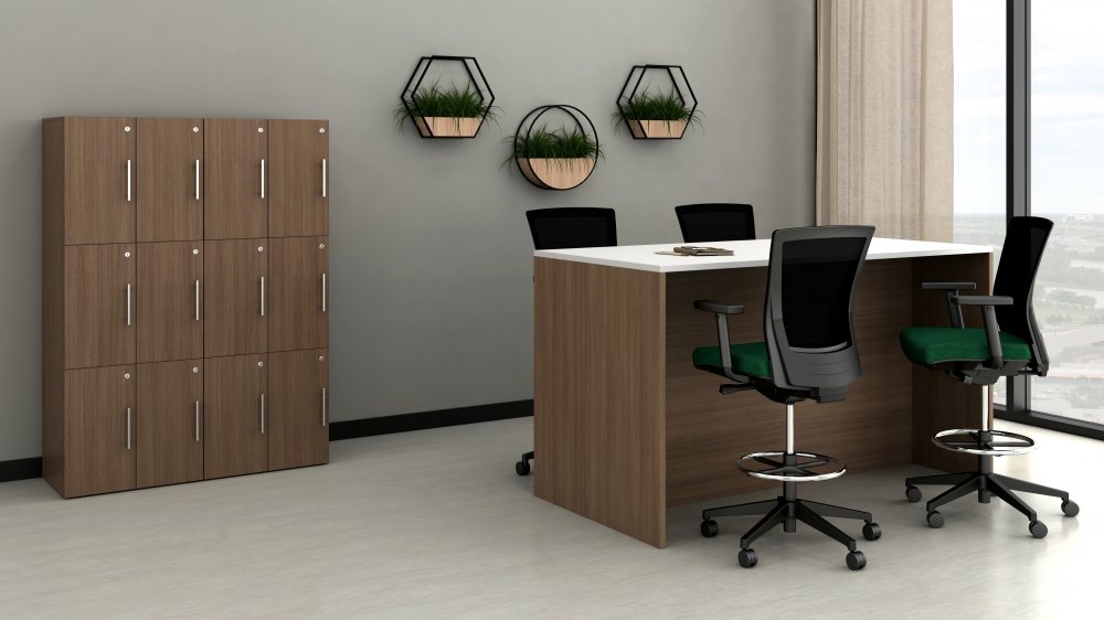 Modern office space with wooden lockers, a white and wood reception desk, three black-office chairs with green cushions, wall decor with three black hexagon and circle planters, and a large window with city view.