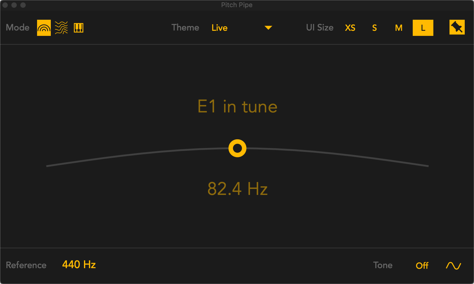 Main view of the Pitch Pipe tuner showing E1 in tune at 82.4 Hz with the circular pitch indicator centered.