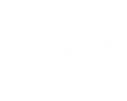Text that says "GANNETT" in white capital letters on a black background.