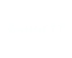 The word 'GANNETT' displayed in bold white capital letters on a black background.