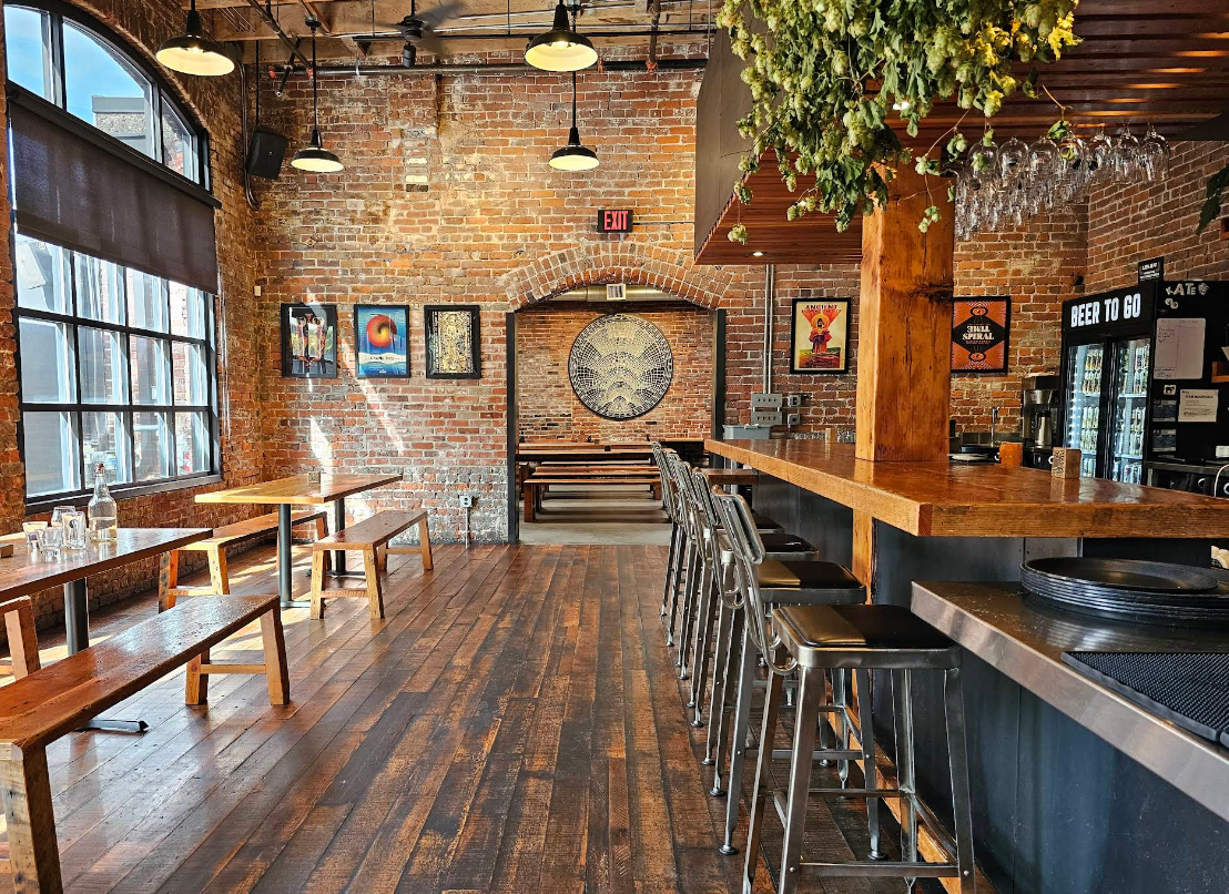 Wayfinder beer is a great brewery, with a beautiful tap room! They offer delicious beers, ciders, and food, and they have a good amount of seating for larger groups.