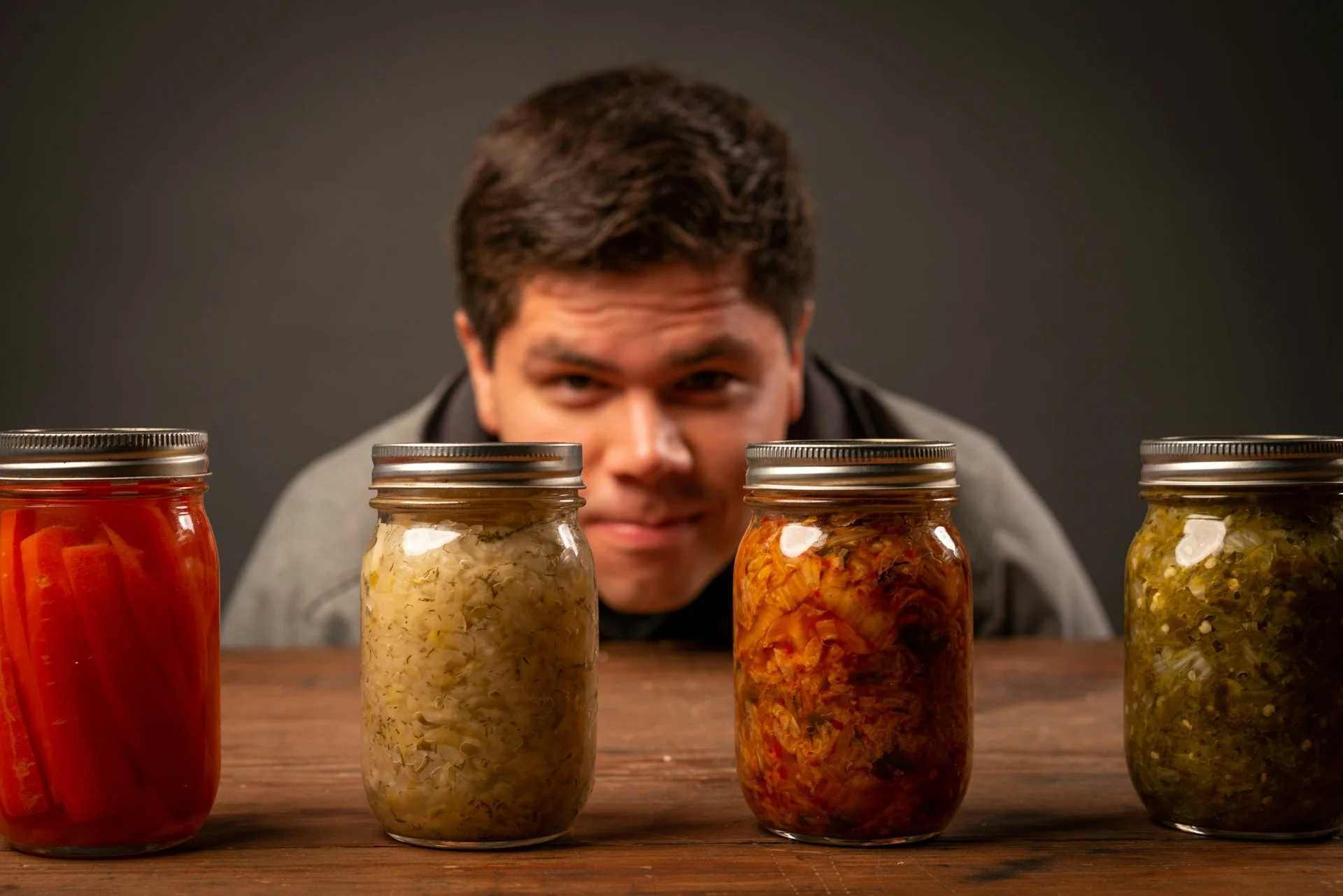 Jars of fermented foods including kimchi, sauerkraut and pickled vegetables, highlighting probiotics, gut health and digestive wellness.