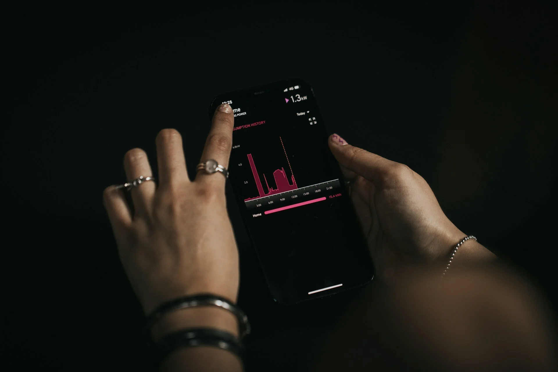 Person reviewing activity and fitness-tracking data on a smartphone.