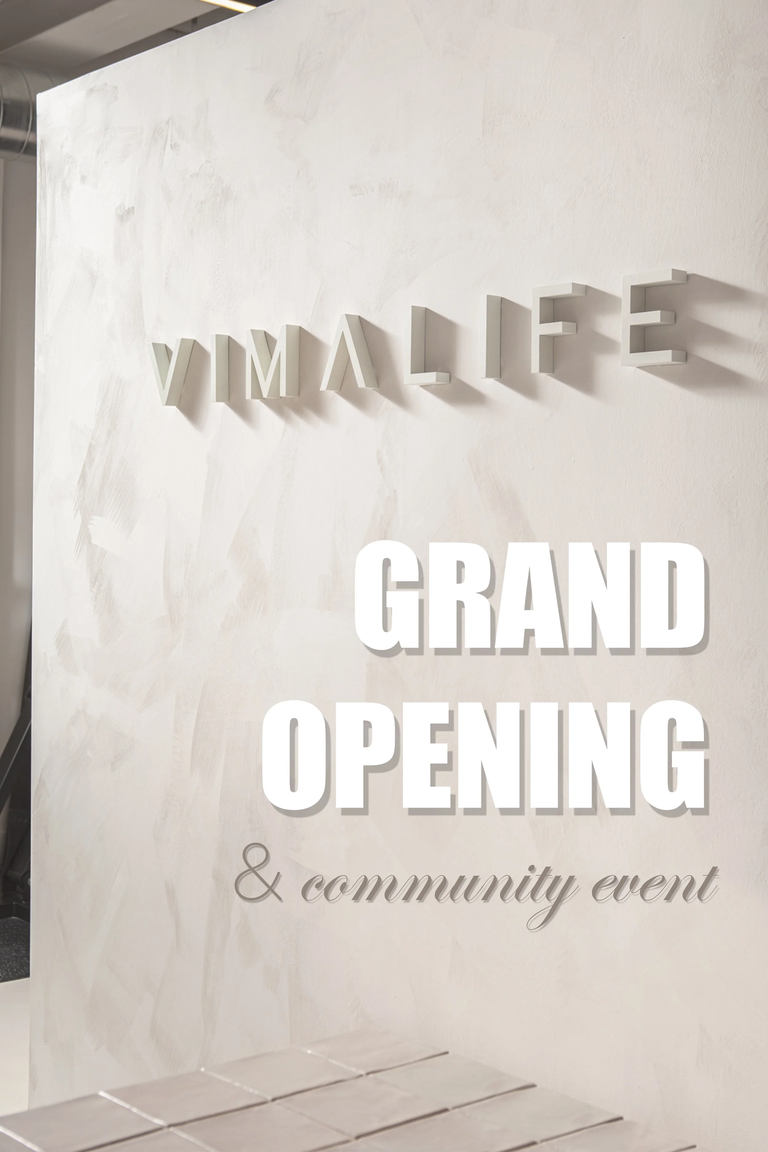A white sign with large raised letters reading 'VILLA LIFE' and additional text below that says '& community event'.