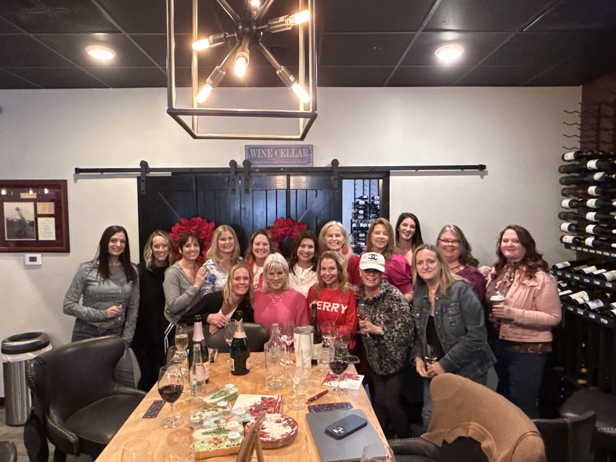 Book club reading of Poinsettia Girl Novel The Wine Cellar Est 2020 Lakeway Texas
