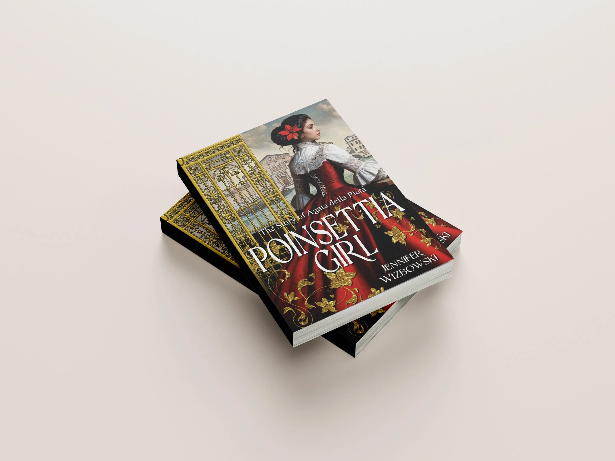 Two paperback books titled "The Story of Agata della Pieta: The Poinsettia Girl" by Jennifer Wizbowski, featuring a cover image of a woman in historical attire with a red dress and black hair adorned with a red flower, set against an ornate gold gate and a European cityscape background.