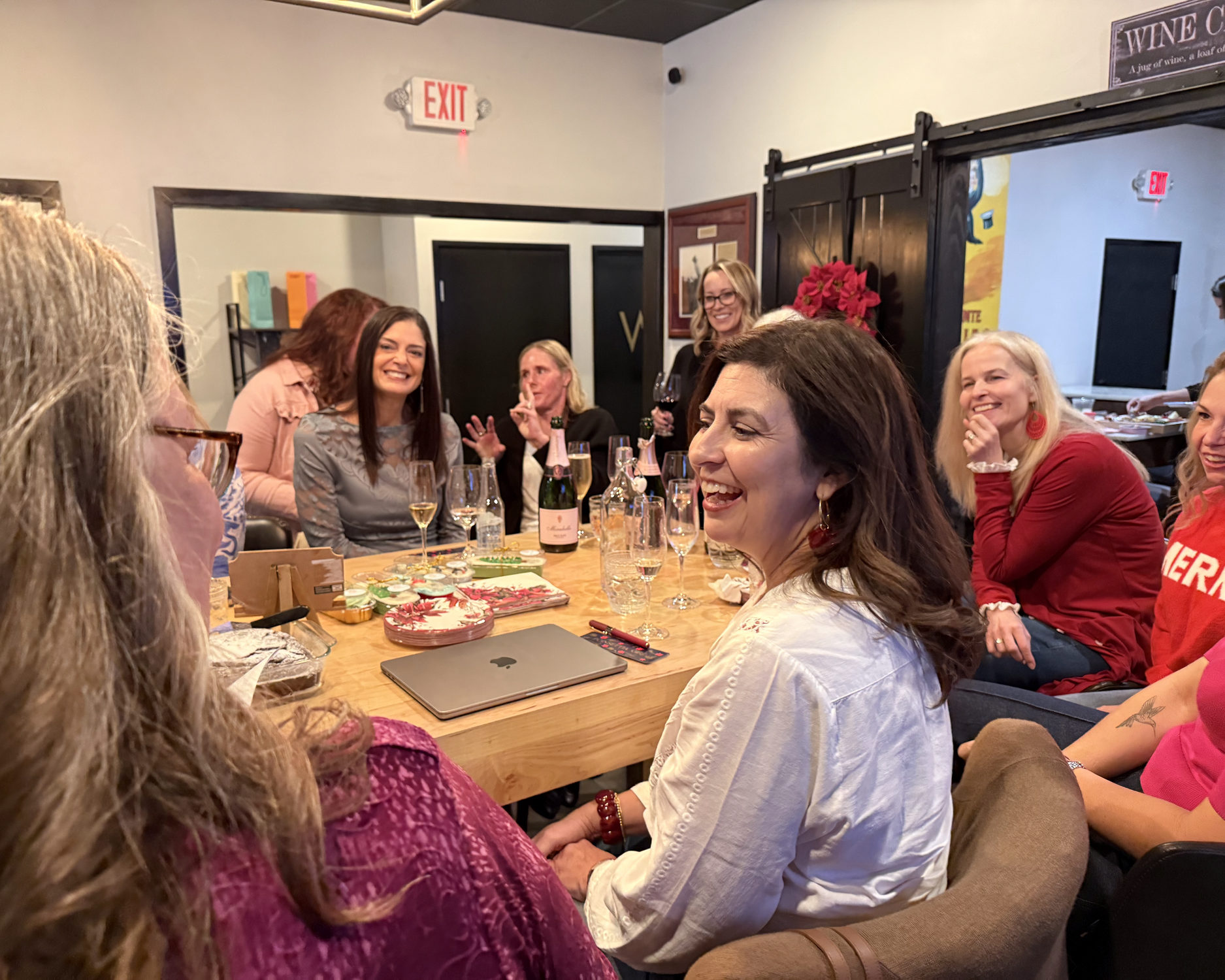 Book club reading of Poinsettia Girl Novel The Wine Cellar Est 2020 Lakeway Texas