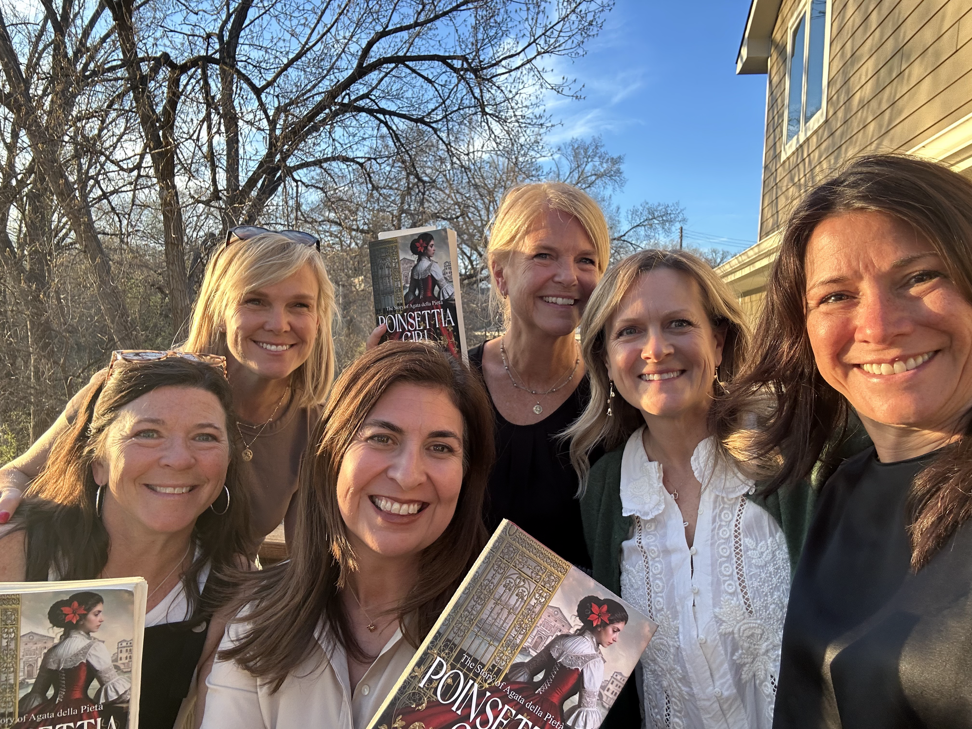 Book club reading of Poinsettia Girl Novel Lake of the Isles Minnesota