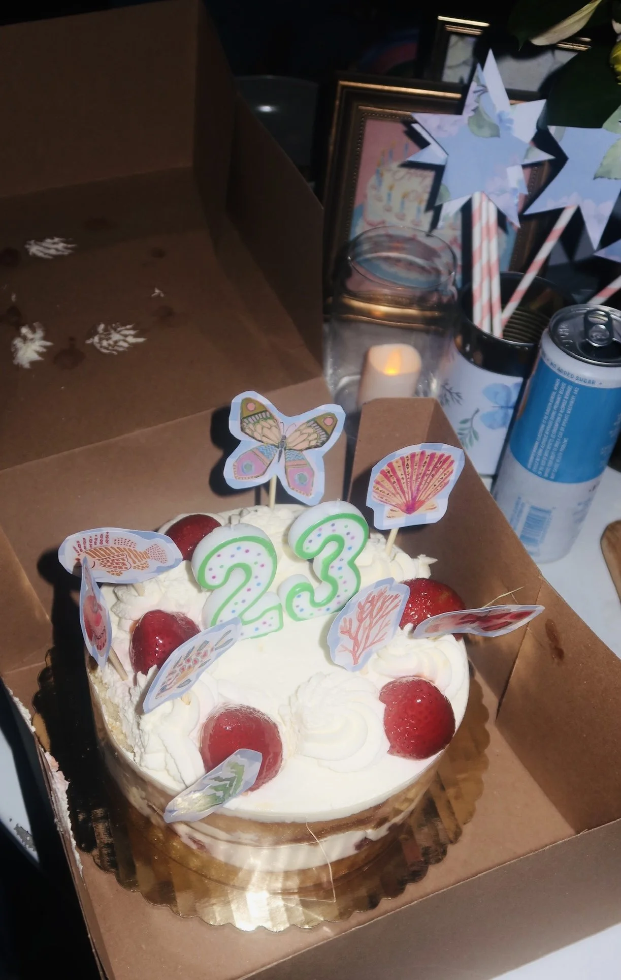 I LOVE to throw a party! For my 23, I wanted to create a nostalgic feel, so I made cut out collages for the cake, fairy wands for the guests, and princess hats. 