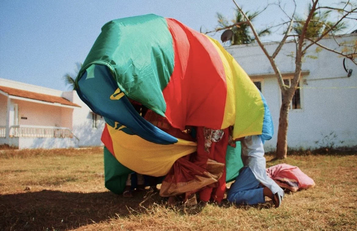 One of my favorite photos I've taken. An implosion of color from the children's parachute in India.