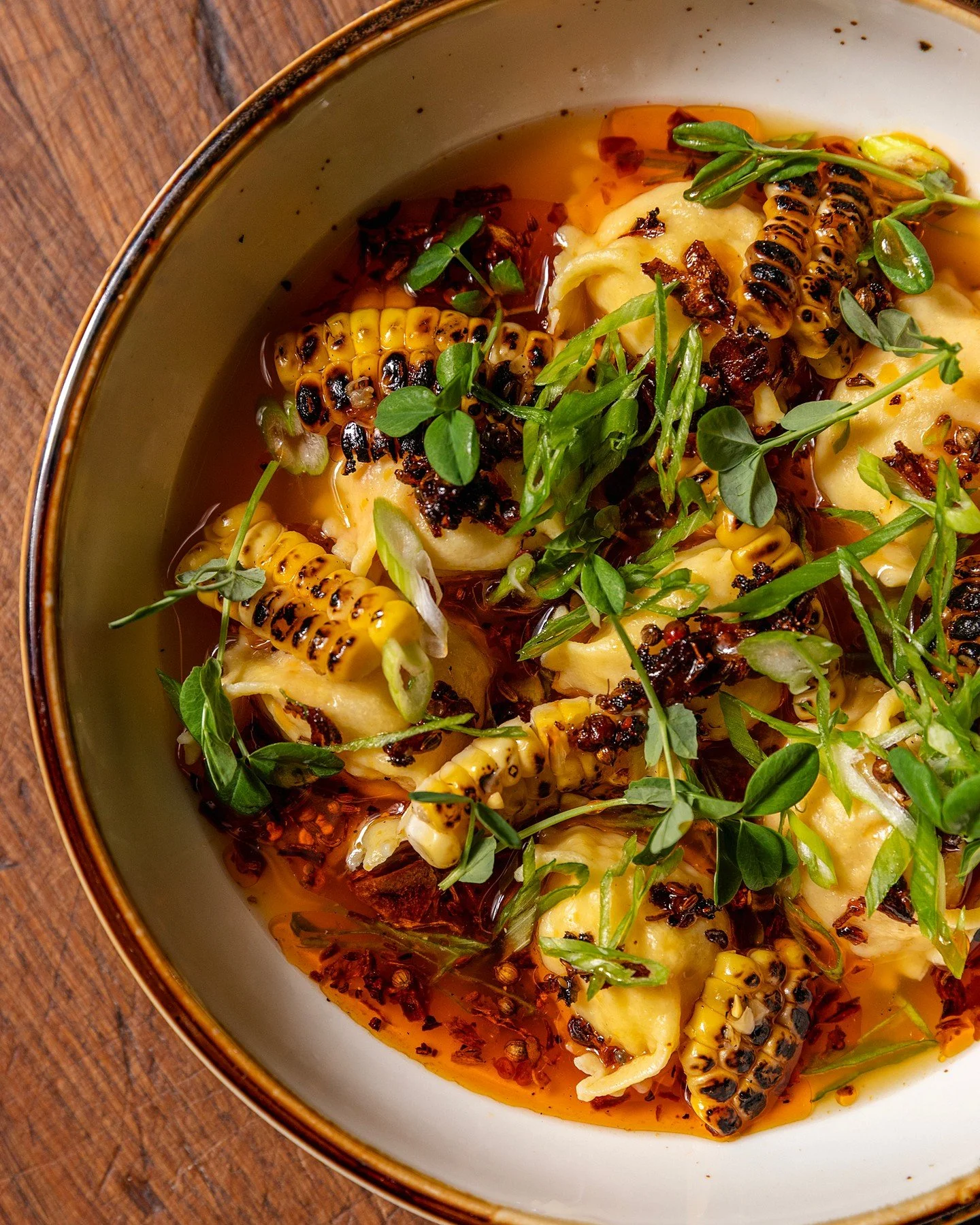 💥NEWBIE ALERT! Shrimp agnolotti just dropped on the menu and we can't stop thinking about it. Cantonese flavors meet Italian technique that sounds wild but tastes incredible. Little pasta pillows stuffed with shrimp, floating in corn scallop broth m