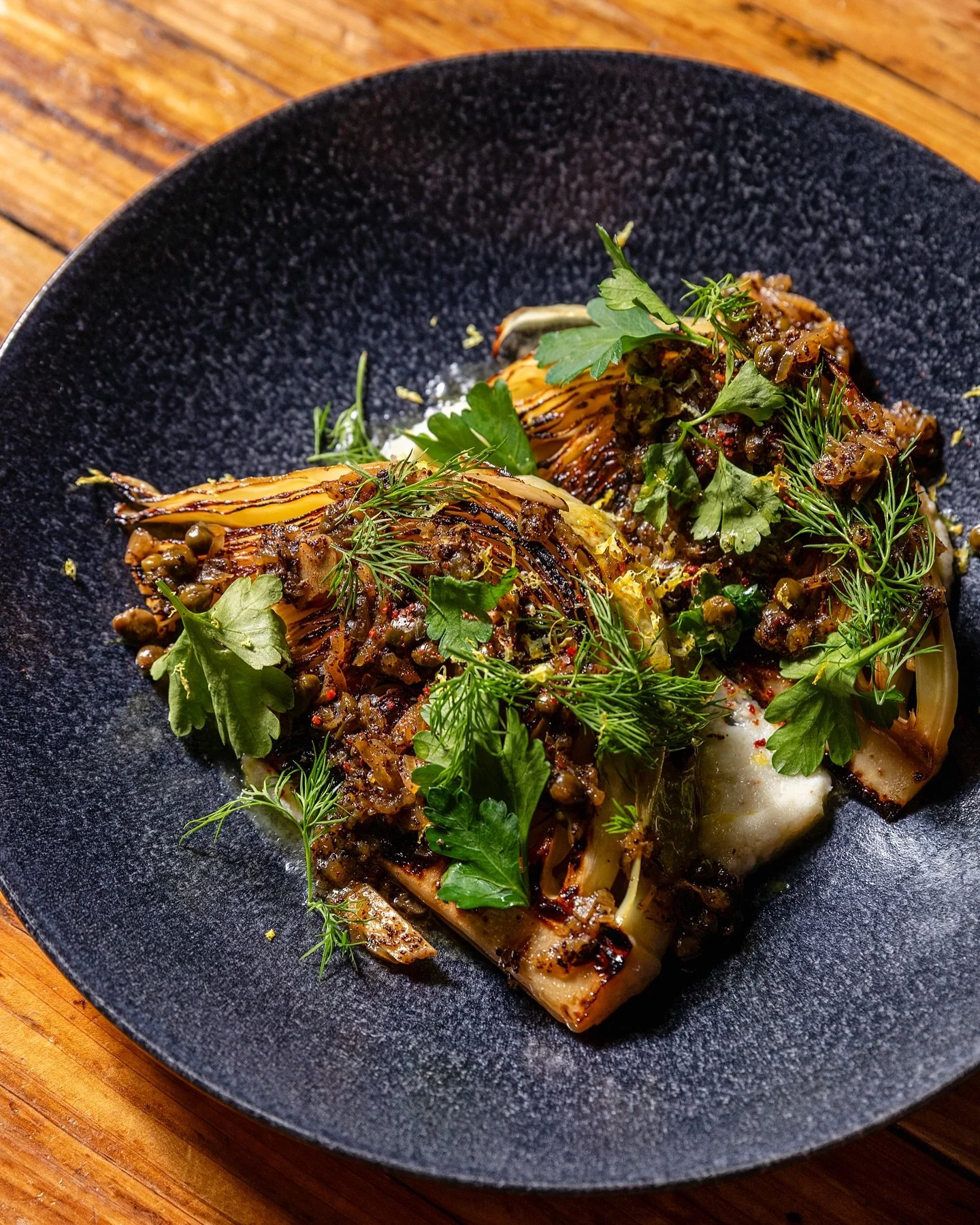 We know y&rsquo;all love when the newbies land, and we know you&rsquo;re gonna love these.

Winter Cabbage &mdash; braised and charred, resting on a taramasalata made with lump crab, crab roe, and Crispelli&rsquo;s sourdough. Caper brown butter, good