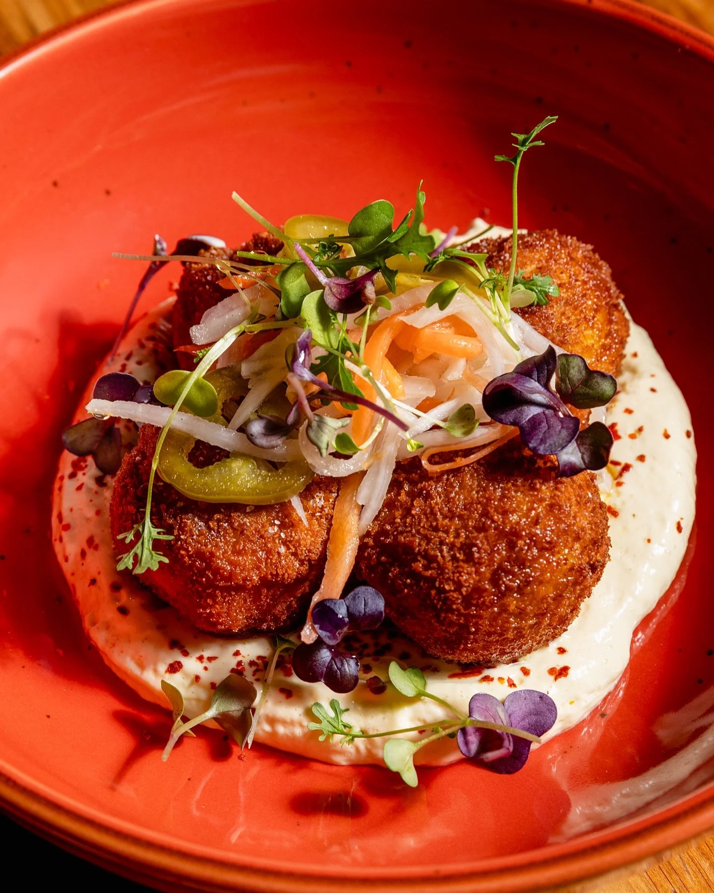We snuck salt cod croquettes onto the menu and yeah, they&rsquo;re as good as they sound. Golden and crispy, loaded with pickled chilies and fresh herbs, hit with lemon and a lemon aioli you&rsquo;re not leaving a drop of. Consider this your heads up